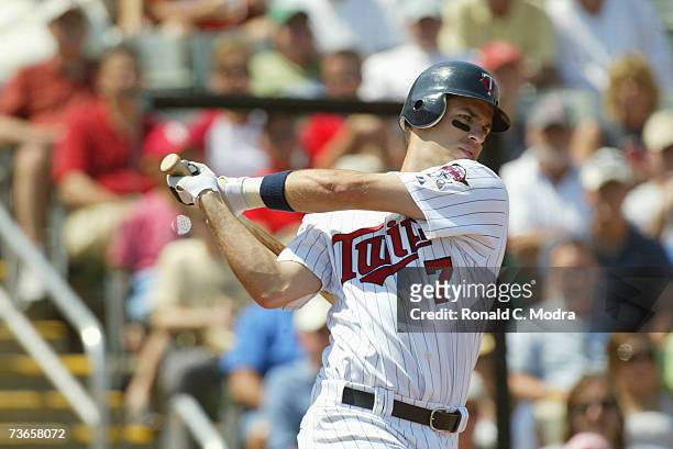 Joe Mauer of the Minnesota Twins batting in a game against the St. Louis Cardinals on March 13, 2007 in Ft. Meyers, Florida.