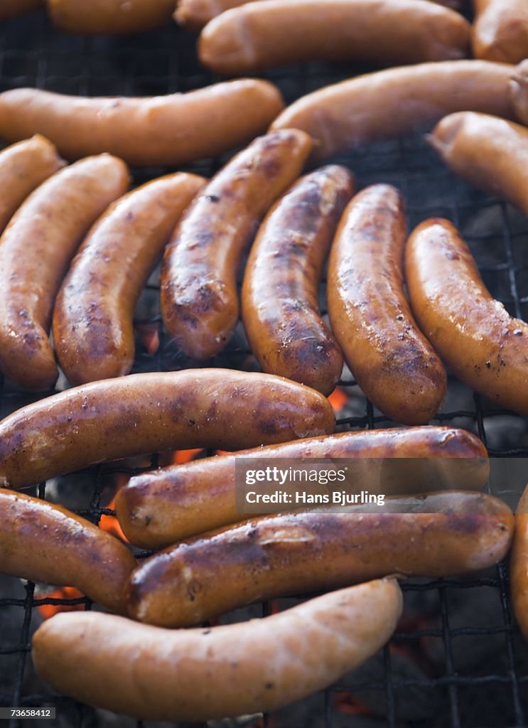 Sausages on a grill.