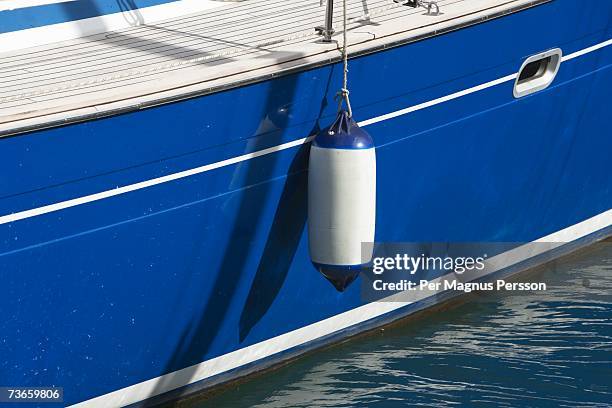 a fender on a sailing boat. - bumper stock pictures, royalty-free photos & images