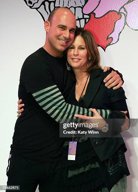 Designer Peter Ross and his mother pose preshow at the Grail Fall 2007 fashion show during Mercedes Benz Fashion Week held at Smashbox Studios on...