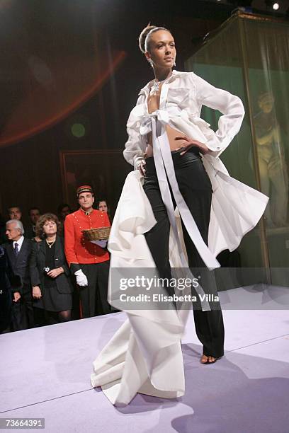 Model walks the runway during the Cartier Spring Party fashion show held at the Galleria Nazionale in Rome on March 21, 2007. The party marks the...