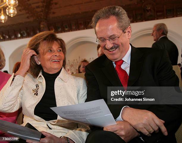 Charlotte Knobloch , president of the central council of Jews in Germany, and Munich Lord Mayor Christian Ude chat prior to the opening ceremony of...