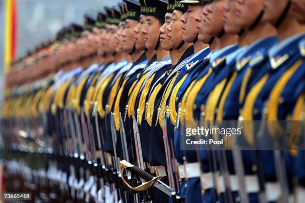The Chinese honor guard awaits inspection during the welcome ceremony for U.S. Chairman of the Joint Chief of Staff, Marine Gen. Peter Pace, at the...