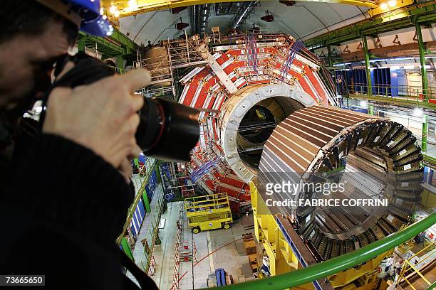Press photographer photographes, 22 Mars 2007 near Geneva, the magnet core of the world's largest superconducting solenoid magnet , one of the...