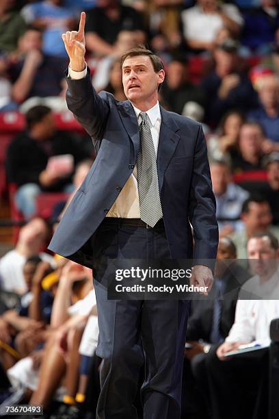 Head coach Rick Carlisle of the Indiana Pacers signals a play during the NBA game against the Sacramento Kings at ARCO Arena on March 6, 2007 in...