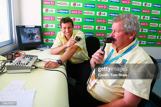 Commentators Michael Atherton and Ian Smith look on during the ICC Cricket World Cup Group C match between Canada and New Zealand at the Beausejour...