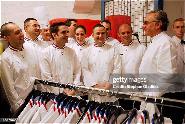 Alan Ducasse stands with other laureates collecting their red, blue and white collars at the World Best Chefs Competition on March 15, 2007 in...