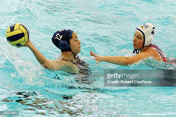 Laura Lopez Ventosa of Spain attempts a pass over Natalia Shepelina of Russia during the Water Polo match between Russia and Spain at the Melbourne...