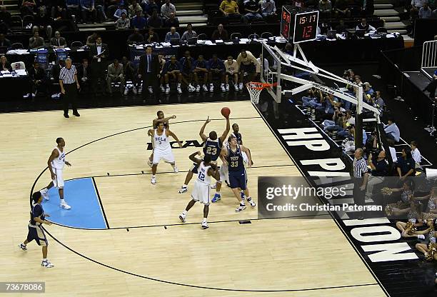 Sam Young of the Pittsburgh Panthers puts up a shot against the UCLA Bruins during round three of the NCAA Men's Basketball Tournament at the HP...