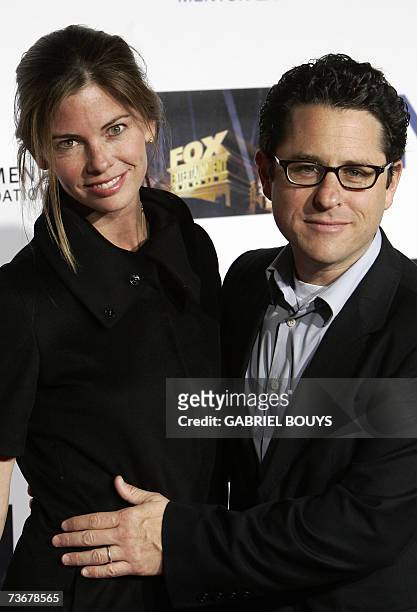 Los Angeles, UNITED STATES: Writer and Producer J.J. Abrams and his wife Katie McGrath arrive at the Mentor LA's Promise Gala honoring Tom Cruise for...