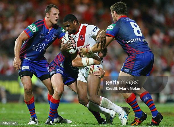 Wes Naiqama of the Dragons is tackled during the round two NRL match between the St George Illawarra Dragons and the Newcastle Knights at Oki Jubilee...