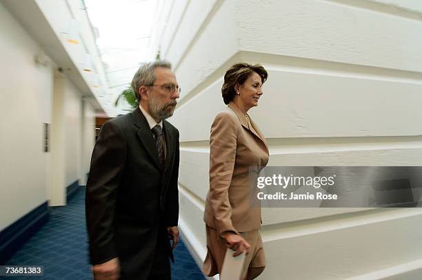 House Speaker Nancy Pelosi walks to a caucus meeting before a pending vote on the Iraq war bill on Capitol Hill March 23, 2007 in Washington, D.C....