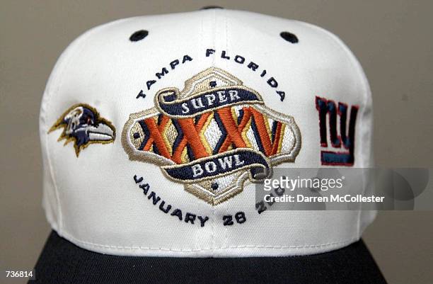 Superbowl XXXV hat complete with logo and team emblems is displayed January 25, 2001 in Boston, Ma. The big game will be played out in Januuary 28,...