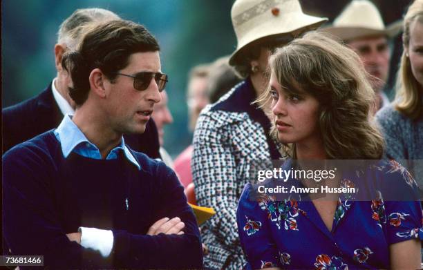 Sabrina Guiness and Prince Charles, Prince of Wales chat at a polo match at Windsor Great Park during August 1979, in Windsor, England. Ms Guinness...