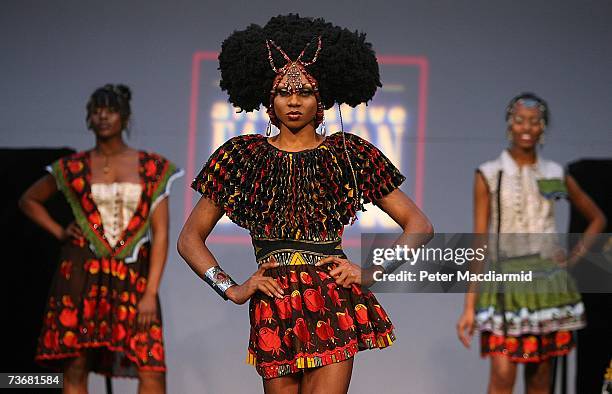 Models pose on the catwalk at a fashion show during the Swatch Alternative Fashion Week on March 23, 2007 in London, England. The Swatch Alternative...