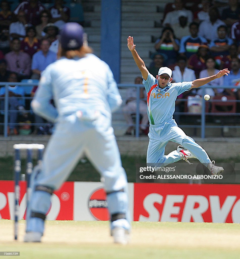 Indian cricketer Agit Agarkar (R) jumps...