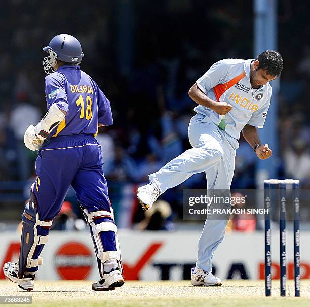 Port-of-Spain, TRINIDAD AND TOBAGO: India Cricketer Munaf Patel celebrates the wiket of Sri Lankan Cricketer Tillakaratne Dilshan, at the Queen's...