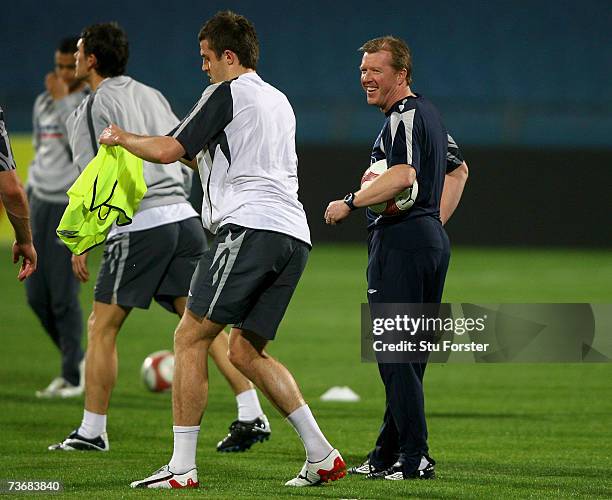 England manager Steve McClaren shares a joke with Michael Carrick during England training at The Ramat Gan Stadium ahead of tomorrows Euro 2008...