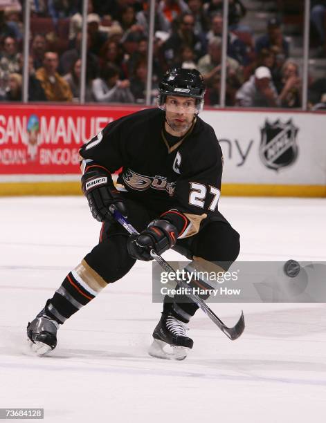 Scott Niedermayer of the Anaheim Ducks skates with the puck against the Nashville Predators at Honda Center on March 4, 2007 in Anaheim, California....