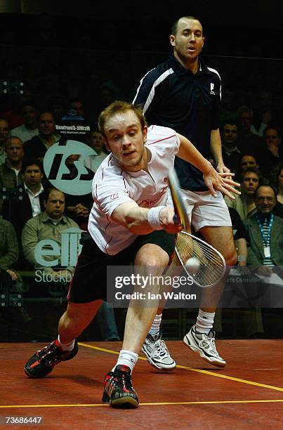 James Willstrop of England in action during his match against John White of Scotland during the final of the ISS Canary Wharf Squash Classic at East...