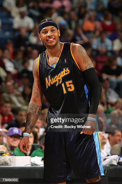 Carmelo Anthony of the Denver Nuggets smiles during the game against the Sacramento Kings at Arco Arena on March 11, 2007 in Sacramento, California....