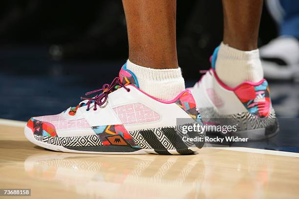 Gilbert Arenas of the Washington Wizards shows off his sneakers during the game against the Golden State Warriors on March 23, 2007 at Oracle Arena...