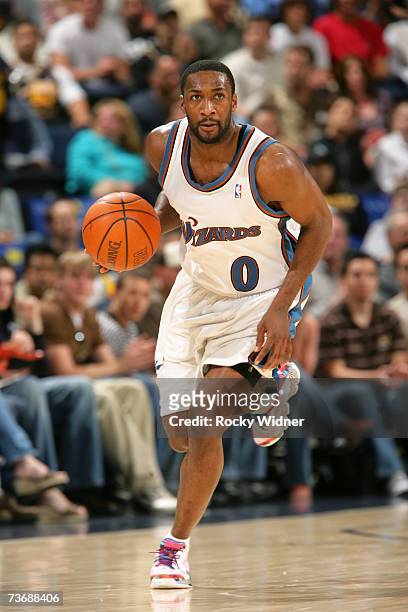 Gilbert Arenas of the Washington Wizards dribbles the ball down court during the game against the Golden State Warriors on March 23, 2007 at Oracle...