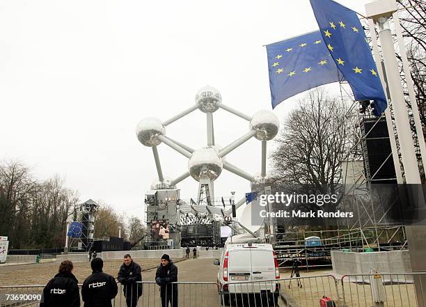 Security personnel stand during preparations for the 50th anniversary of the Treaty Of Rome celebrations at the Atomium monument on March 24, 2007 in...