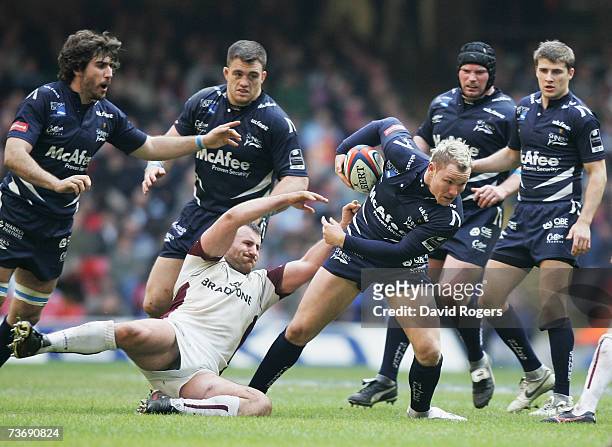 Lee Thomas of Sale brushes aside Leicester's George Chuter during the EDF Energy Cup Semi Final match between Leicester Tigers and Sale Sharks at the...