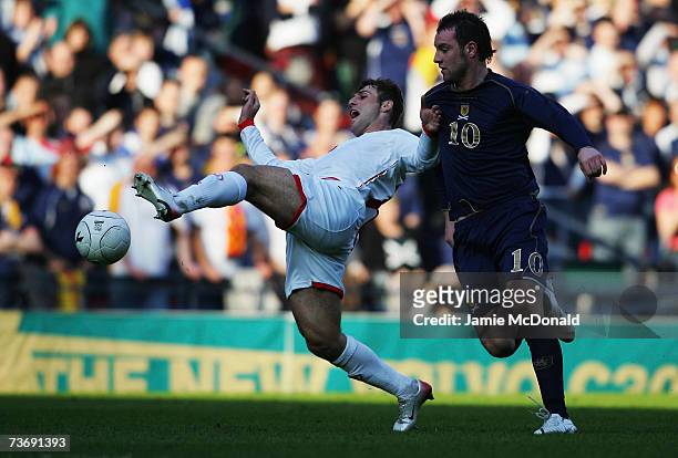 Kris Boyd of Scotland battles with Vladimer Burduli of Georgia during the Euro2008, Group B, qualifier between Scotland and Georgia on March 24, 2007...