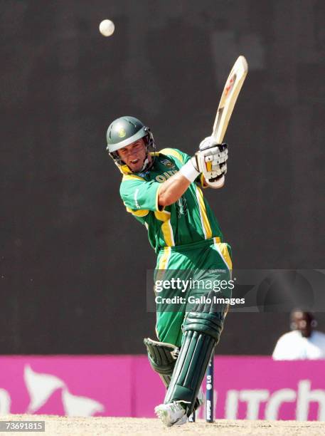 De Villiers hits a Glen McGrath delivery during the ICC Cricket World Cup 2007 Group A match between Australia and South Africa at Warner Park on...