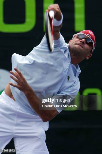 Arnaud Clement of France serves to Tomas Berdych of the Czech Republic during day four at the 2007 Sony Ericsson Open at the Tennis Center at Crandon...