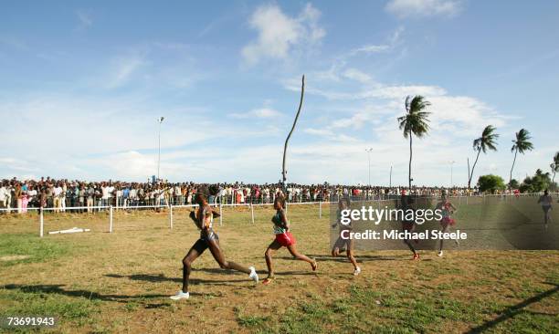 Lornah Kiplagat of the Netherlands leads the field in the the women's senior race at the IAAF World Cross Country Championships on March 24, 2007 in...