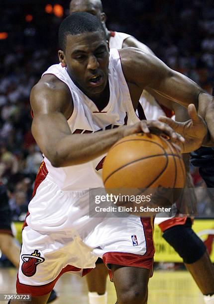 Guard Eddie Jones of the Miami Heat battles for a loose ball against the Philadelphia 76ers on March 24, 2007 at the American Airlines Arena in Miami...