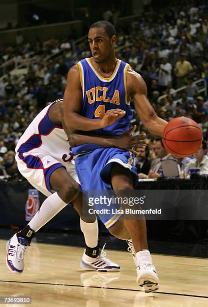 Arron Afflalo of the UCLA Bruins drives the ball against the Kansas Jayhawks during the west regional final of the NCAA Men's Basketball Tournament...