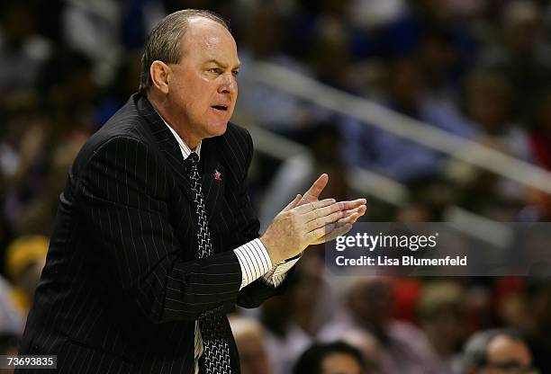 Head coach Ben Howland of the UCLA Bruins cheers on his team during the west regional final of the NCAA Men's Basketball Tournament against the...