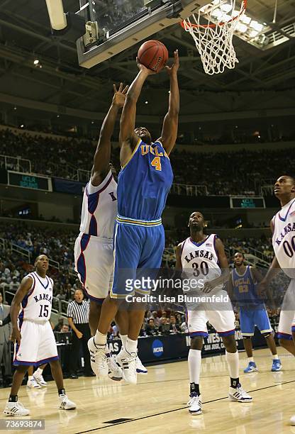 Arron Afflalo of the UCLA Bruins puts up a shot against the Kansas Jayhawks during the west regional final of the NCAA Men's Basketball Tournament at...