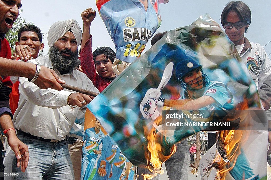 Indian Cricket Fans Burn posters and an...