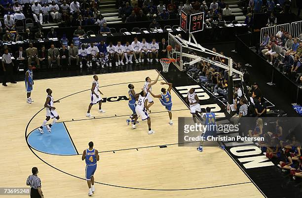 Josh Shipp of the UCLA Bruins lays up a shot against the Kansas Jayhawks during the regional final of the NCAA Men's Basketball Tournament at the HP...