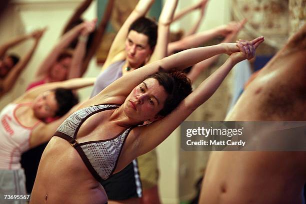 Students practice the unique Bikram Yoga at the City Studio, on March 13, 2007 in London, England. The Bikram Yoga, also known as Hot Yoga, is a...