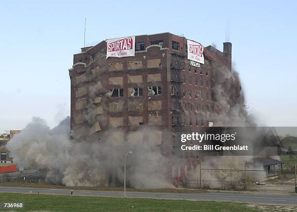 As four hundred pounds of explosives detonate, the old Lambert Pharmaceutical building implodes November 18, 2000 in St. Louis, Missouri. The old...