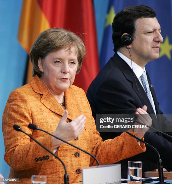 German Chancellor Angela Merkel, whose country currently holds the EU presidency, and European Commission President Jose Manuel Barroso hold the...