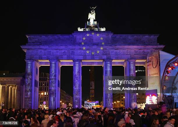 Berlin's Brandenburg Gate is illuminated during the 50th anniversary celebrations of the signing of the Treaty of Rome, March 25, 2007 in Berlin...