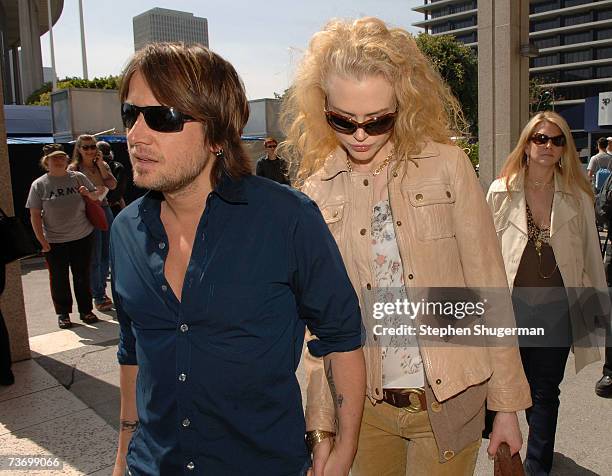 Singer Keith Urban and wife actress Nicole Kidman attend the World Premiere of "Distracted" starring Rita Wilson at the Mark Taper Forum on March 25,...