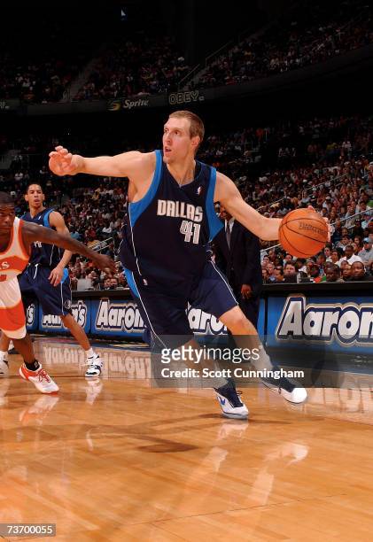 Dirk Nowitzki of the Dallas Mavericks drives to the basket against the Atlanta Hawks at Philips Arena on March 25, 2007 in Atlanta, Georgia. NOTE TO...