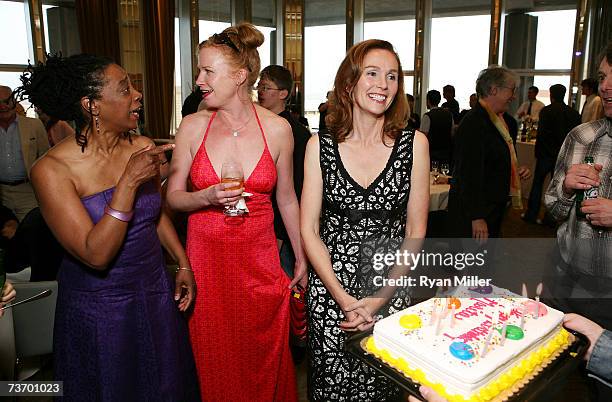 Actresses and cast members Stephanie Berry, Johanna Day and Marita Geraghty celebrate Marita's birthday with a cake at the party for the World...