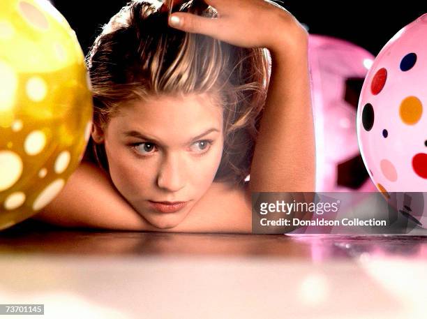 Actress Claire Danes poses for a magazine shoot in 1996 at a studio, in Los Angeles, California.