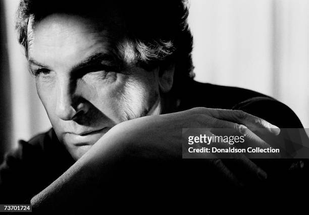 Actor Danny Aiello poses for a photo shoot in 1989 in his hotel room, in Los Angeles, California.