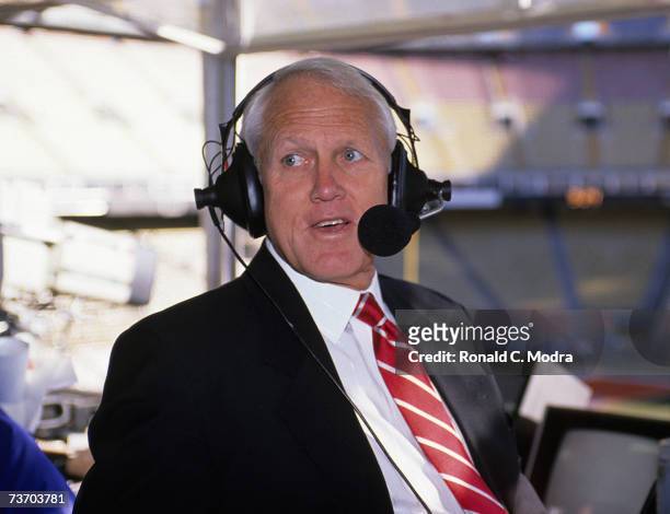 Bill Walsh broadcasts the AFC Playoff Game between the Cleveland Browns and the Denver Broncos for NBC on January 14, 1990 in Denver, Colordao.