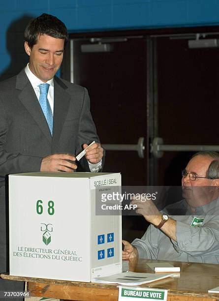The leader of the separatist Parti Quebecois, Andre Boisclair votes 26 March 2007, in Montreal as voters of the French-speaking Quebec province...